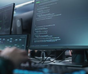Close Up of a Software Developer Working on a Desktop Computer, Close Up of a Software Developer Working on a Desktop Computer,